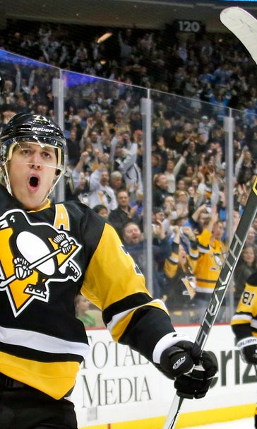 Malkin's big night pushes Penguins past Wild